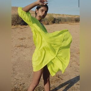 BNWT AIRI MINI DRESS IN FLUORO GREEN size 2 M/L